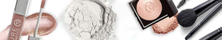 Makeup products including brushes and powders on a white background
