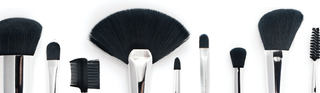 Pure Cosmetics 10-piece brush set laid flat on white background.