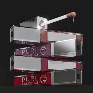 Pure Cosmetics lip gloss with applicator on a black background