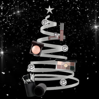 Pure Cosmetics PUREfect gift collection on silver christmas tree with silver stars on black background