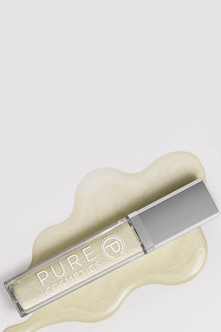 Pure Cosmetics Light Up Lip Gloss in Clear, the Gloss of the Month. Butter-yellow gloss with sleek silver cap and high-shine swatch backdrop.