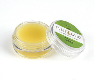 Image showing close-up of Pure Lano ultra-nourishing lip balm formula in a pot for flavor vanilla.