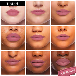 Image showcasing diverse group of Pure Cosmetics models wearing Light Up Lip Gloss in shade On Pointe - a rosy pink pigmented gloss.